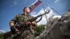 Луганскіге кірер жолдағы сепаратистердің тоқсауыл бекеті. 24 маусым 2014 жыл. 