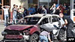 На месцы забойства Паўла Шарамета. Кіеў, 20 ліпеня 2016 году