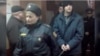Барбашынскага прывялі на абвяшчэньне выраку на ланцугу
